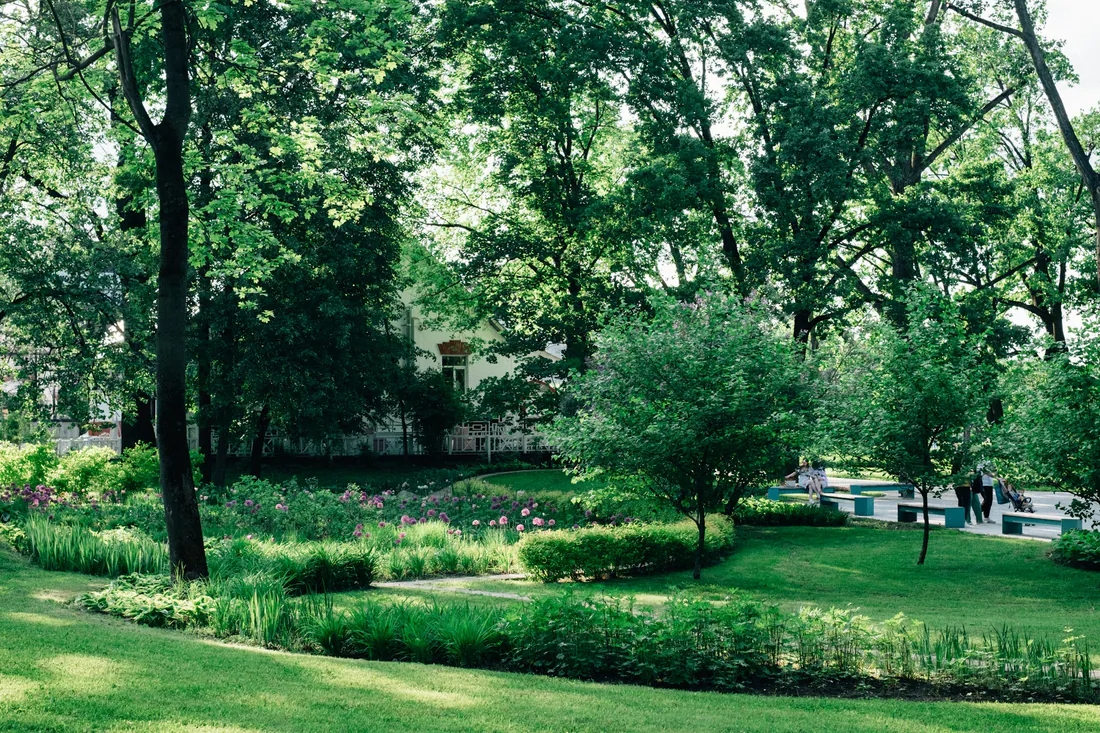 Landscaped green park with mature trees